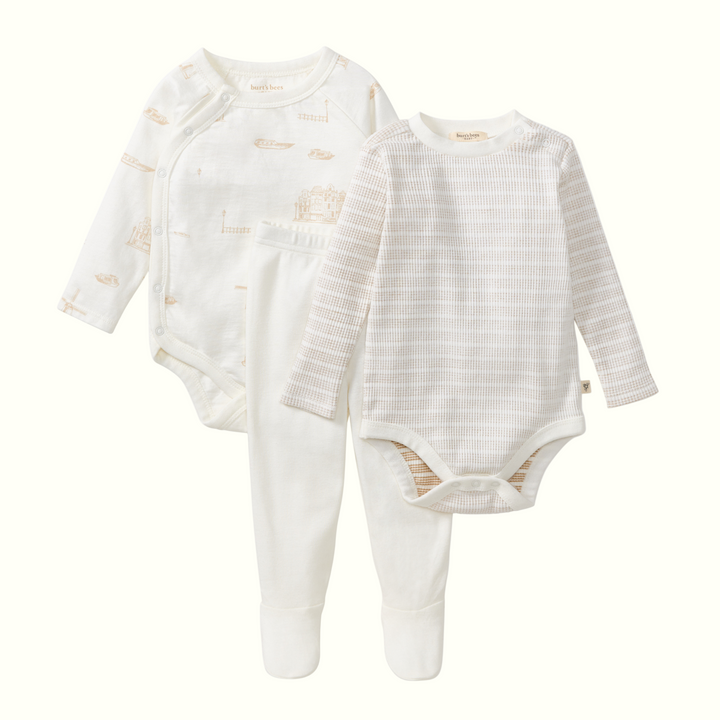 Two baby bodysuits with long sleeves and legs on a white background
