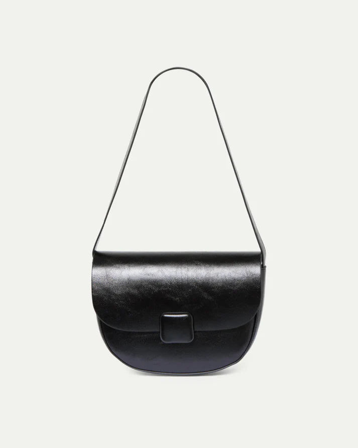 Black handbag with a strap on a white background