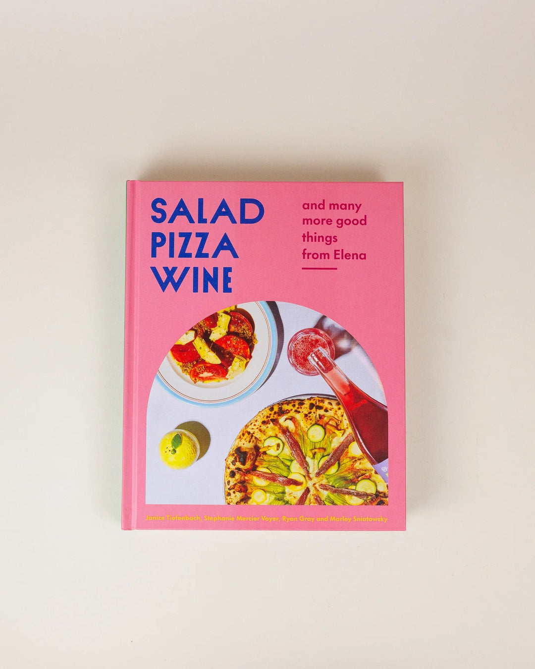 Book titled 'Salad Pizza Wine' on a light beige background