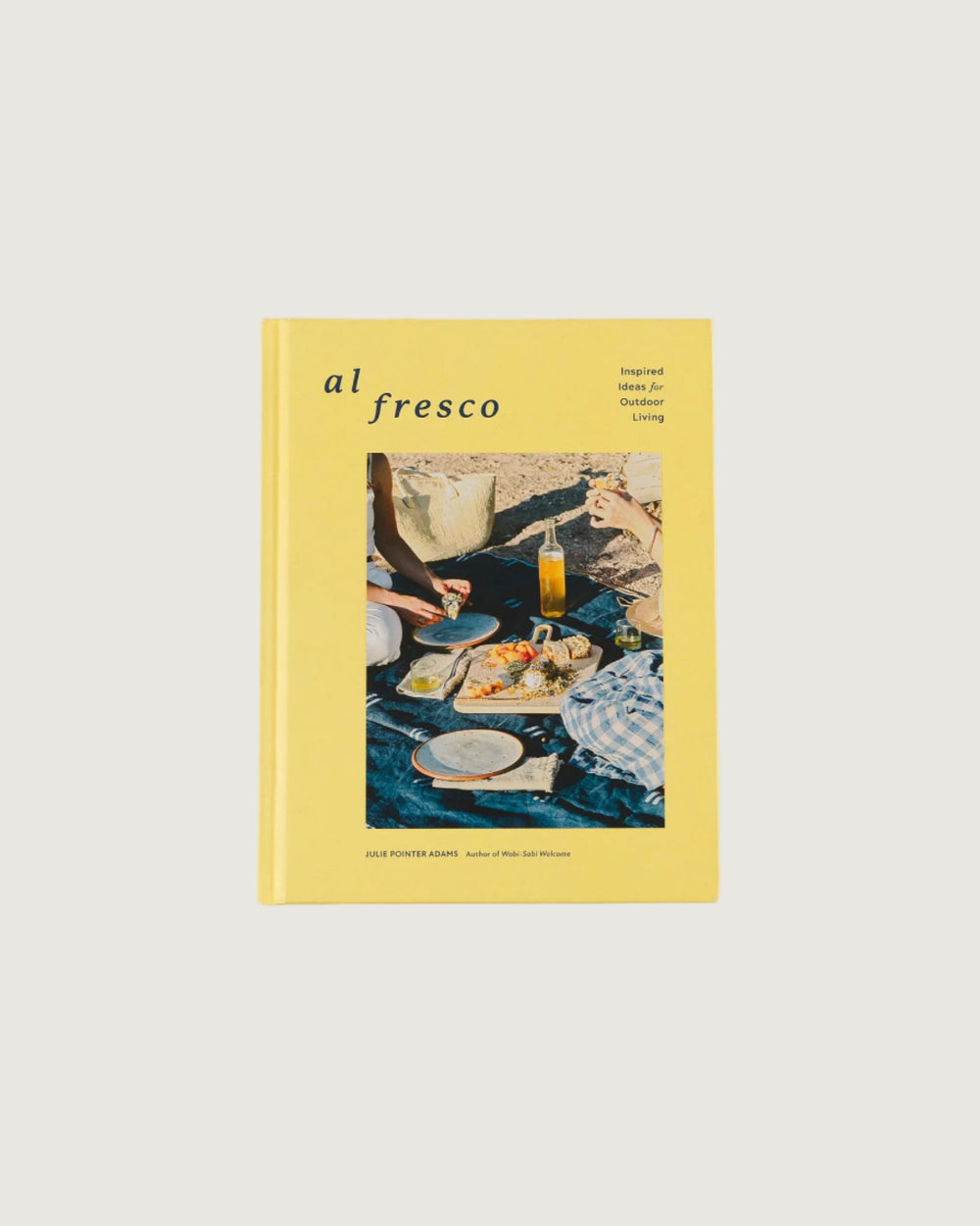 Book titled 'al fresco' with a cover image of a table setting on a yellow background