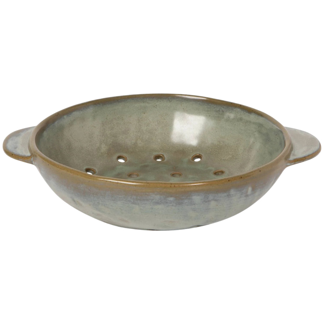 Ceramic berry colander with handles on a white background