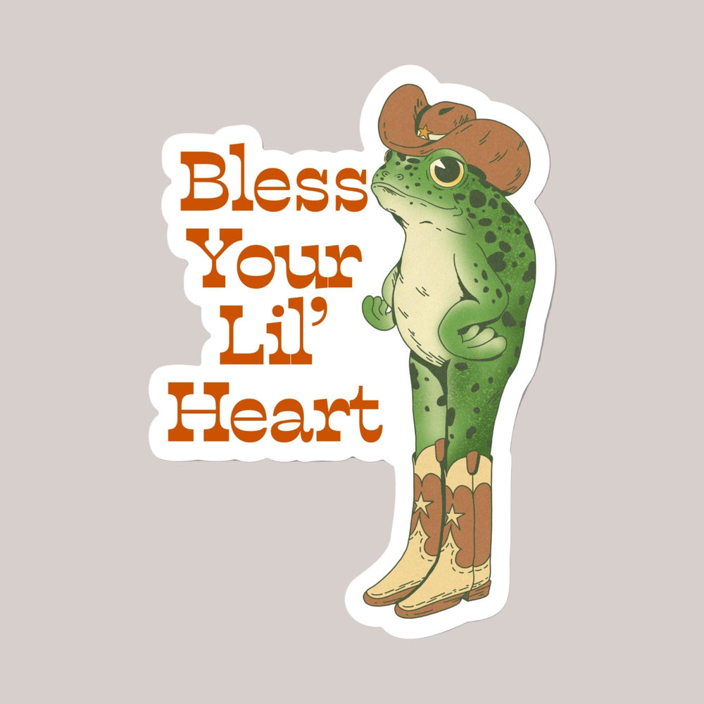 Sticker with a frog wearing a cowboy hat and boots, and text 'Bless Your Lil' Heart' on a white background.