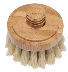 Bristle brush with wooden handle on a white background
