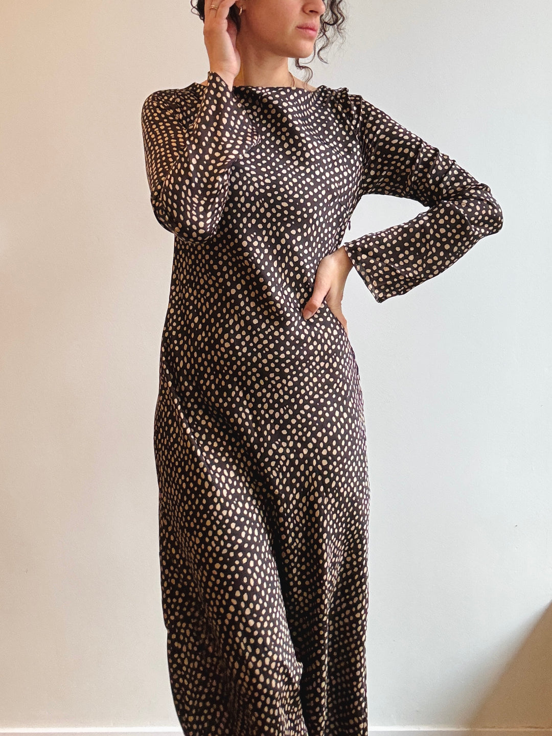 Woman wearing a brown and white patterned dress against a plain background - cute boutique in avondale logan square chicago, winsome shopwinsome